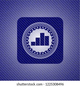 chart icon inside badge with jean texture