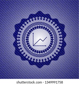 chart icon inside badge with jean texture