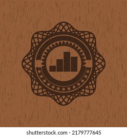 icono de gráfico dentro de la placa con fondo de madera. 