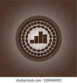 chart icon inside badge with wooden background