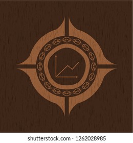 chart icon inside badge with wooden background