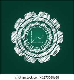 chart icon inside chalk emblem written on a blackboard