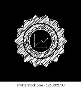 chart icon inside chalkboard emblem on black board