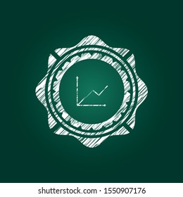 chart icon inside chalkboard emblem written on a blackboard