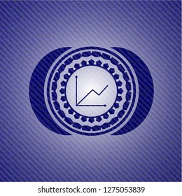 chart icon inside emblem with jean background