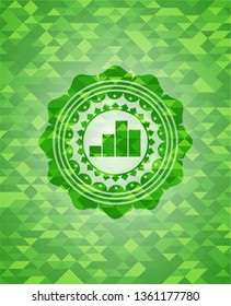 chart icon inside green emblem with mosaic background
