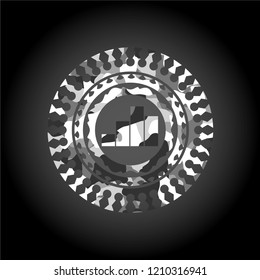 chart icon inside grey camo emblem