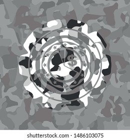  chart icon inside grey camouflage emblem