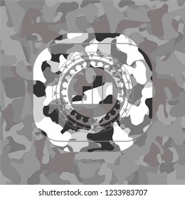 chart icon inside grey camouflaged emblem