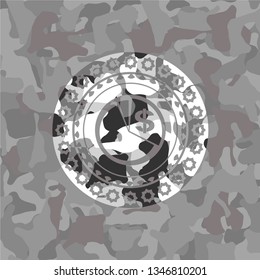 chart icon inside grey camouflaged emblem