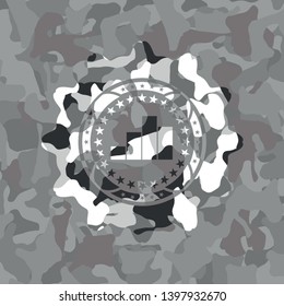 chart icon inside grey camouflaged emblem