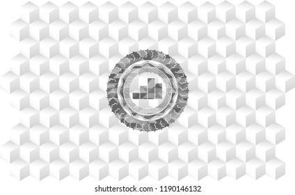 chart icon inside grey emblem with geometric cube white background