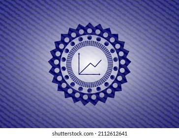 icono de gráfico dentro del fondo de jean o denim. 