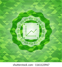 chart icon inside realistic green mosaic emblem
