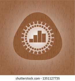 chart icon inside realistic wood emblem