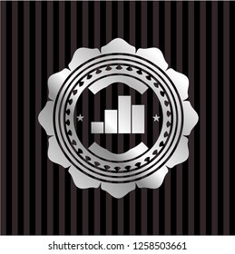 chart icon inside silver badge or emblem