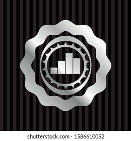 chart icon inside silvery emblem