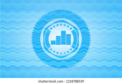 chart icon inside water wave concept badge.