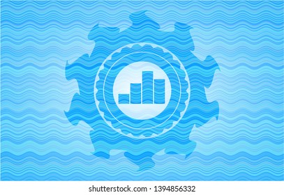 chart icon inside water wave representation emblem.