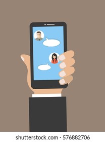 Chat connection icon. There is a hand, holding a phone, in the picture. Vector illustration