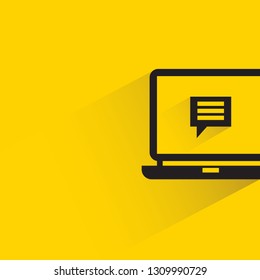 chat message in laptop with shadow on yellow background