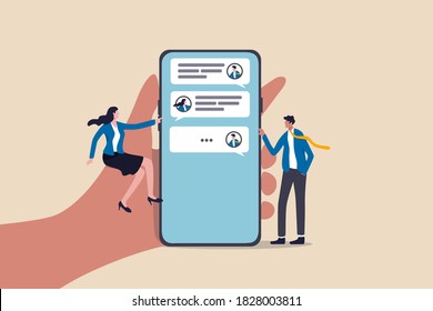 Chat Mobile application for business, teamwork using technology to communicate or collaborate in work concept, businessman and businesswoman communicate with mobile app on big hand holding smart phone