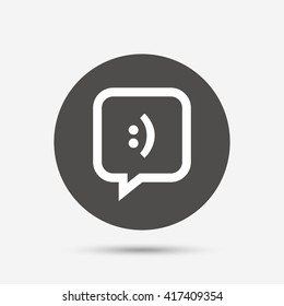 Chat sign icon. Speech bubble with smile symbol. Communication chat bubbles. Gray circle button with icon. Vector