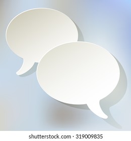 Chat speech bubbles ellipse vector white on a light blue bokeh fog background.