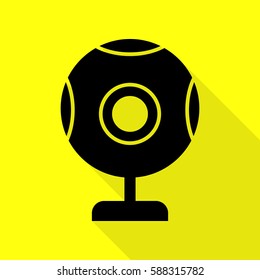 Chat web camera sign. Black icon with flat style shadow path on yellow background.