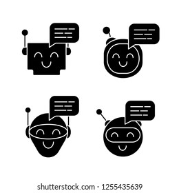 Chatbots messages glyph icons set. Talkbots. Laughing virtual assistants. Conversational agents. Modern robots. Silhouette symbols. Vector isolated illustration