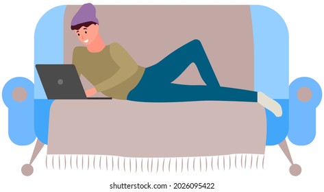 Chatting, communication and sending messages via Internet. Man is lying and using laptop to chat. Typing on computer keyboard, online home relaxation. Guy spends time at laptop for communication