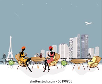 Chatting girls in the cafe