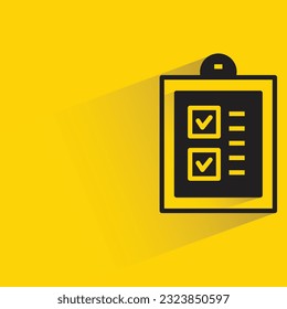 check list clipboard with shadow on yellow background