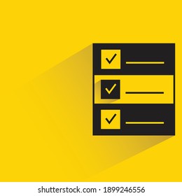 check list document with drop shadow on yellow background