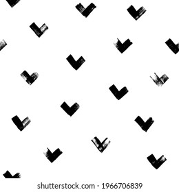 Check mark brush strokes vector seamless pattern. Chevron texture or wallpaper. Grunge geometric pattern, hand drawn tribal vector background. Graphic brush strokes zig zag ink illustration.