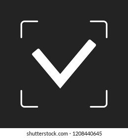 Check mark icon. White object in camera autofocus on dark background