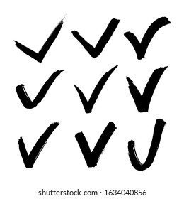 Check Mark symbol set. Tick or Confirm sign black brush stroke hand drawn collection. Vector illustration.