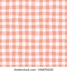 Check pattern in earthy pink. Vector seamless repeat of hand drawn checked gingham design. Cute and trendy geometric illustration. Design background resource.