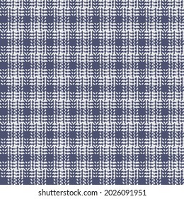 Check plaid pattern tweed for dress, jacket, skirt, scarf in blue purple and light grey. Seamless textured tartan check graphic background for spring summer autumn winter fashion fabric design.
