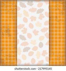 Checked cloth with autumnd foliage cover. Eps 10 vector file.
