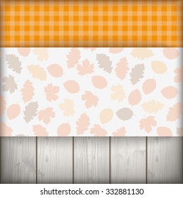Checked cloth with autumnd foliage cover. Eps 10 vector file.