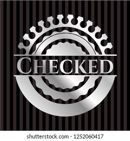 Checked silver badge or emblem