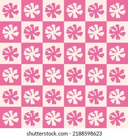 Checkerboard monochrome seamless pattern with  organic shaped flowers in pink colors. Colorful vector background in retro style 60s, 70s.