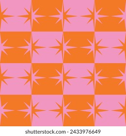 checkered atomic starbursts in pink and orange on geometric squares seamless pattern. For retro backgrounds, wallpaper and home décor 