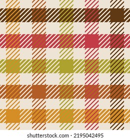 Checkered gingham plaid seamless pattern in red, green, orange and brown. For Thanksgiving fabric, textile and texture