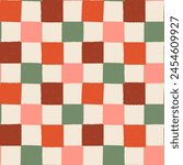 Checkered Pattern. Seamless background with painted checks. Colorful textured checkerboard print. Brush strokes squares backdrop. Chessboard wallpaper. Red, green, beige and pink repeated tiles