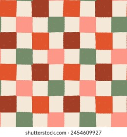 Checkered Pattern. Seamless background with painted checks. Colorful textured checkerboard print. Brush strokes squares backdrop. Chessboard wallpaper. Red, green, beige and pink repeated tiles