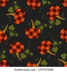 
Checkered pumpkins with stems and leaves on a dark background. Farmhouse Decor. Vector design .
