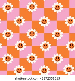 Checkered retro happy flowers on pink and orange checkerboards seamless pattern. For stationary, wrapping paper and textile. 