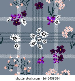 Checkered spring pattern. Seamless print with chamomiles and garden flowers.Template for textile design, cards, gift wrappings.